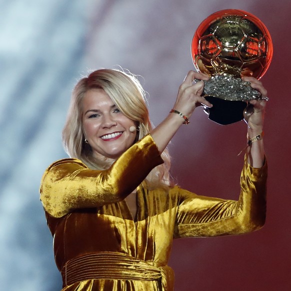 FILE - In this Dec. 3, 2018, file photo, Olympique Lyonnais soccer player Ada Hegerberg celebrates with the Women&#039;s Ballon d&#039;Or award during the Golden Ball award ceremony at the Grand Palai ...