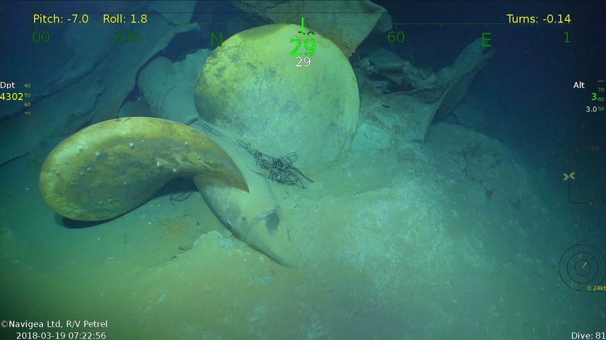 In this Monday, March 19, 2018, underwater video image courtesy of Paul Allen shows a propeller, part of wreckage from the USS Juneau, a U.S. Navy ship sunk by the Japanese torpedoes 76 years ago, fou ...