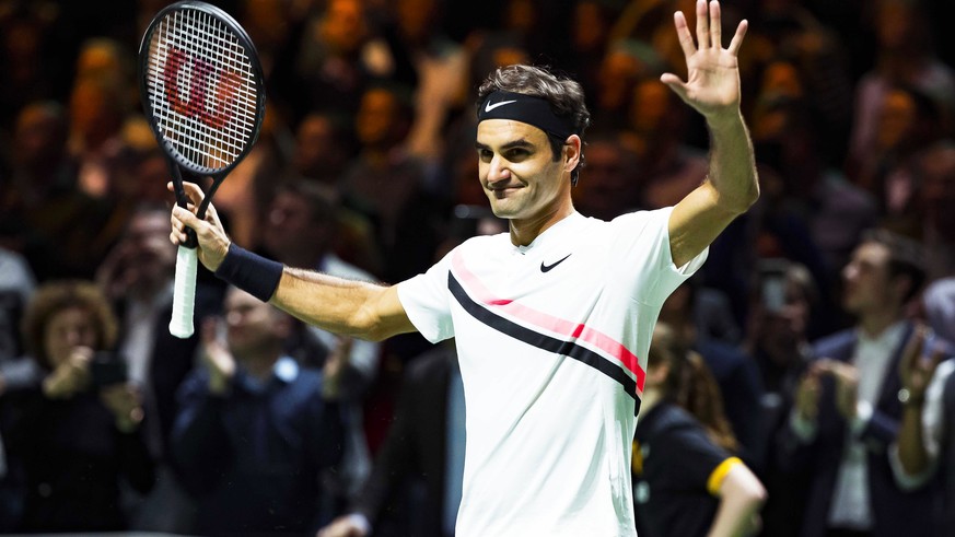 epa06540080 Roger Federer of Switzerland celebrates after defeating Grigor Dimitrov of Bulgaria in their final match of the ABN Amro World Tennis Tournament in Rotterdam, Netherlands, 18 February 2018 ...