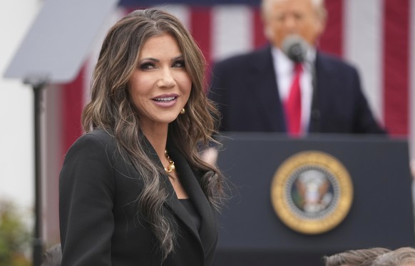 Homeland Security Secretary Kristi Noem is recognized as President Donald Trump speaks during an event to announce new tariffs in the Rose Garden at the White House, Wednesday, April 2, 2025, in Washi ...