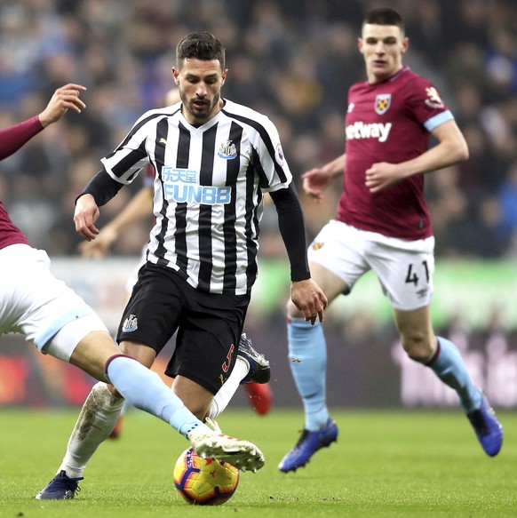 West Ham United's Fabian Balbuena, left, and Newcastle United's Fabian Schar bviefor the ball during the English Premier League soccer match between Newcastle United and West Ham United at S ...