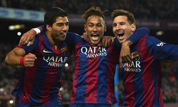 FC Barcelona&#039;s Lionel Messi, from Argentine, right, Neymar, from Brazil, center, and Luis Suarez, from Uruguay, celebrate after scoring against Atletico Madrid during a Spanish La Liga soccer mat ...