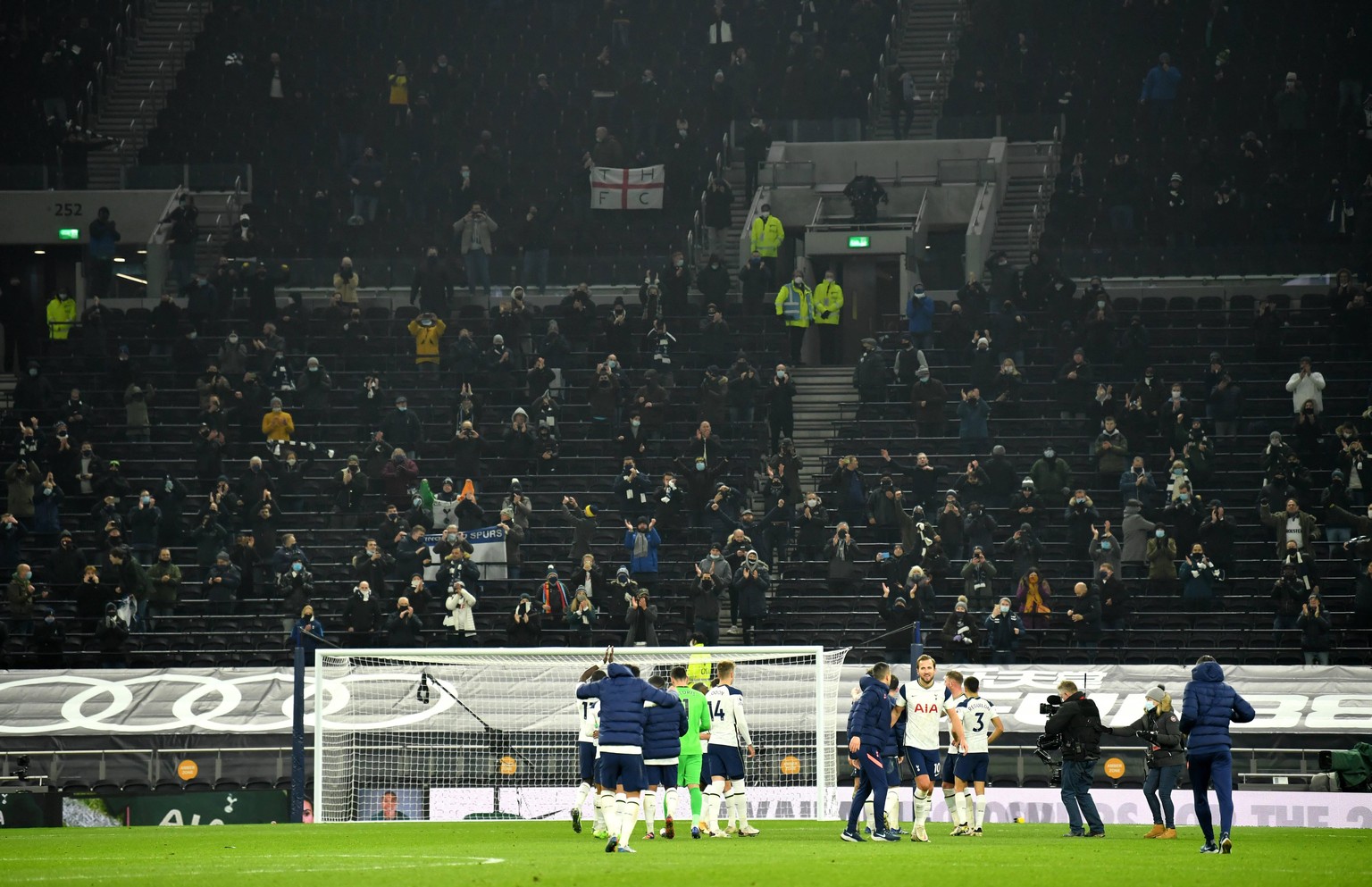 201207 -- LIVERPOOL, Dec. 7, 2020 -- Liverpool s supporters react before the English Premier League match between Liverpool FC and Wolverhampton Wanderers FC in Liverpool, Britain, on Dec. 6, 2020. FO ...