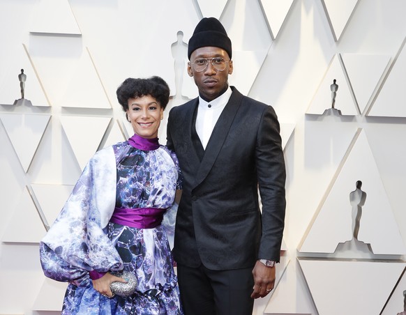 epa07394854 Amatus Sami-Karim (L) and Mahershala Ali (R) arrive for the 91st annual Academy Awards ceremony at the Dolby Theatre in Hollywood, California, USA, 24 February 2019. The Oscars are present ...