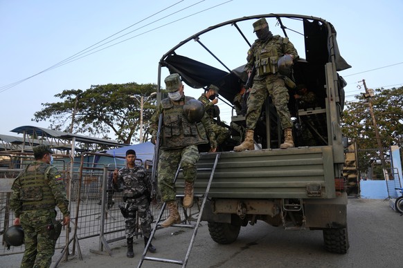 Soldiers arrive to the Litoral penitentiary after a deadly prison riot, in Guayaquil, Ecuador, Monday, Nov. 15, 2021. The riots that broke out inside the jail to date have caused at least 68 deaths. ( ...