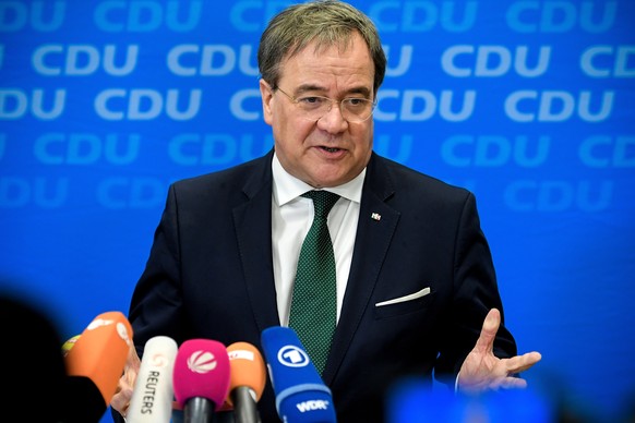 epa08209398 Prime Minister of North Rhine-Westphalia Armin Laschet speaks to the media at the CDU district office in Aachen, Germany, 10 February 2020. Christian Democratic Union (CDU) chairwoman Anne ...