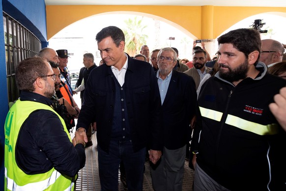 epa07842214 Acting Spanish Prime Minister Pedro Sanchez (C) visits the flooded region of Los Alcaceres, Murcia, eastern Spain, 14 September 2019. A total of six people have died due to the &#039;gota  ...