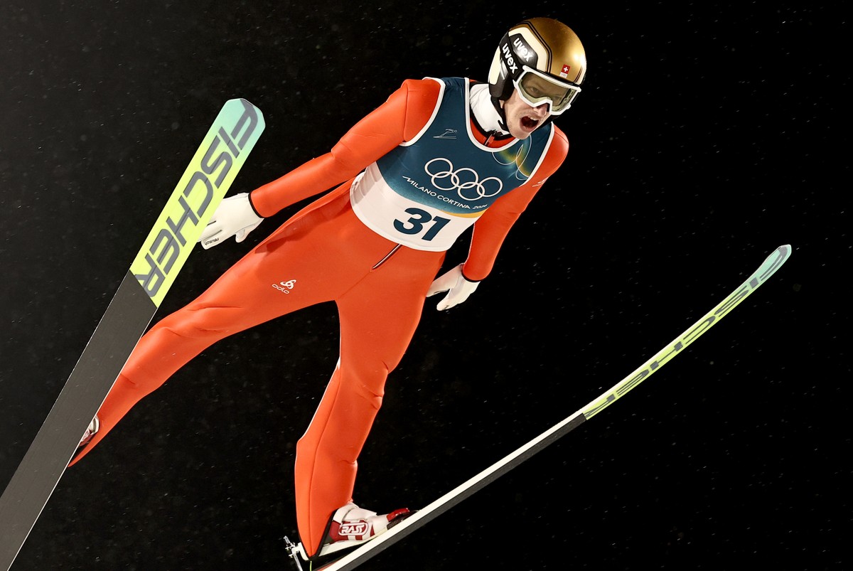 epa12740063 Gregor Deschwanden of Switzerland competes in the Men's Large Hill of the Ski Jumping competitions at the Milano Cortina 2026 Winter Olympic Games, in Predazzo, Italy, 14 February 202 ...