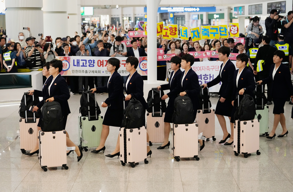 Members of North Korea's soccer club Naegohyang Women's FC team arrives at Incheon International Airpot in Incheon, South Korea, Sunday, May 17, 2026. (AP Photo/Ahn Young-joon)