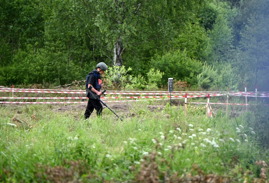 Demining equipment tested in Lviv region A participant in the Future of Demining: Ukraine in Action exhibition takes part at the Ukrainian Training and Testing Complex UTTC in Lviv region, Ukraine, on ...