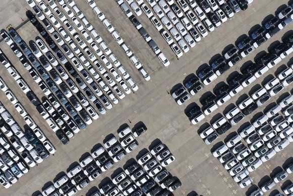 FILE -An aerial view of new cars awaiting export to oversea markets is seen at a port in Shanghai, March 10, 2026. (Chinatopix via AP, File)
China-Auto-Sales