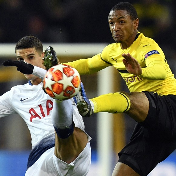 Tottenham midfielder Erik Lamela fights for the ball with Dortmund defender Abdou Diallo, right, during the Champions League round of 16, 2nd leg, soccer match between Borussia Dortmund and Tottenham  ...