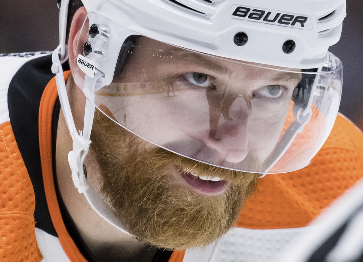 Philadelphia Flyers' Claude Giroux lines up for a faceoff during the third period of the team's NHL hockey game against the Vancouver Canucks on Thursday, Oct. 28, 2021, in Vancouver, Britis ...