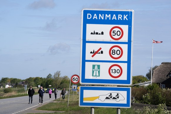 epa08427357 A demonstration to open the borders between Denmark and Germany, at the border crossing at Saed, near Toender, Denmark, 17 May 2020. Denmark closed its borders with Sweden and Germany as a ...