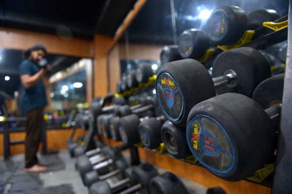 epa12873568 A man works out in a gym on World Health Day in Peshawar, Pakistan, 07 April 2026. World Health Day is celebrated on 07 April to mark the World Health Organisation's (WHO) founding in ...