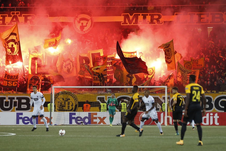 YB's fans burn fireworks during the UEFA Europa League group B match between Switzerland's BSC Young Boys Bern and Serbia's FK Partizan Belgrade, in the Stade de Suisse Stadium in Bern, Switzerland, o ...