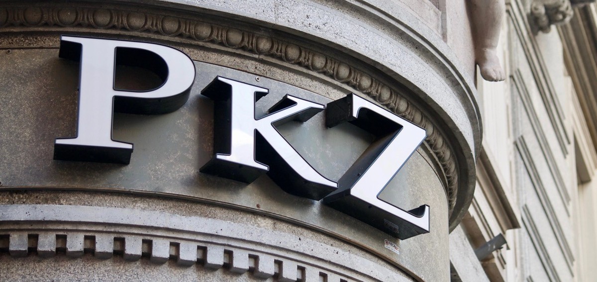 Lugano, Ticino, Switzerland - 7th January 2020 : PkZ logo sign hanging on a store entrance in Lugano, Switzerland. PkZ is a famous Swiss apparel store company