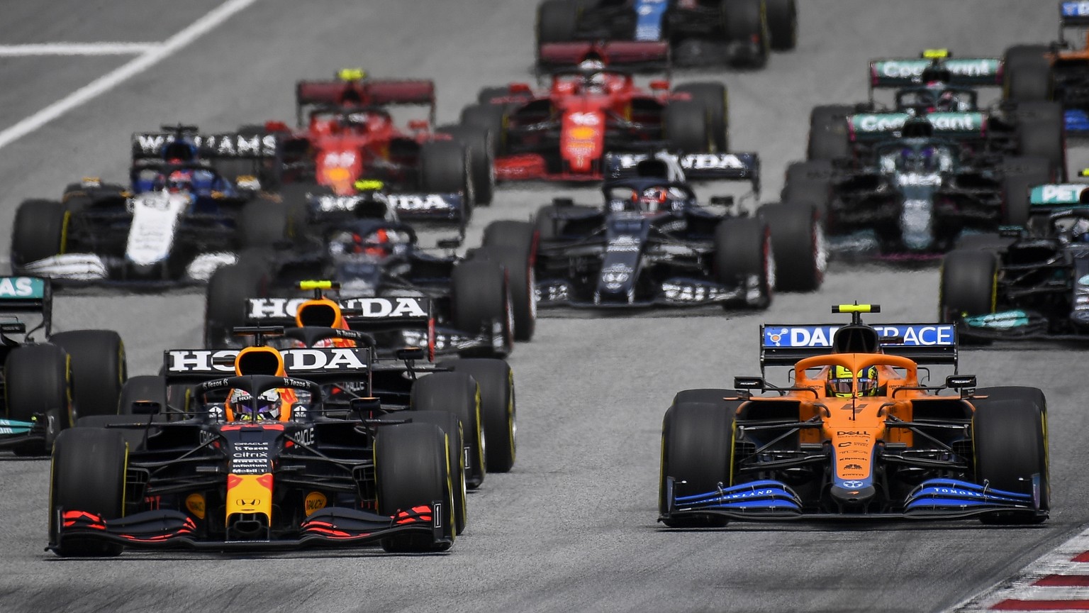 epa09322166 Dutch Formula One driver Max Verstappen (L) of Red Bull Racing and British Formula One driver Lando Norris (R) of McLaren in action during the Formula One Grand Prix of Austria at the Red  ...