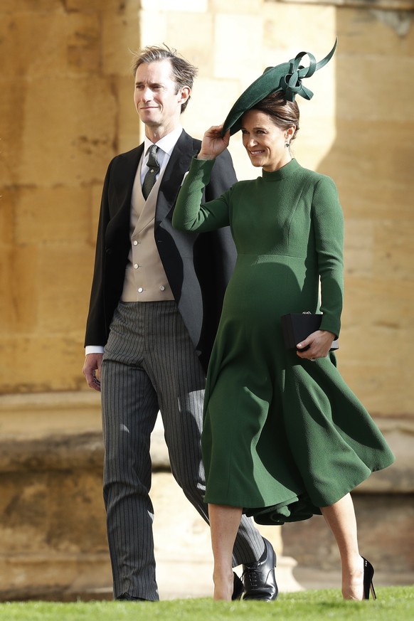 Pippa Matthews and husband James Matthews arrive to attend the wedding of Princess Eugenie of York and Jack Brooksbank at St George’s Chapel, Windsor Castle, near London, England, Friday Oct. 12, 2018 ...