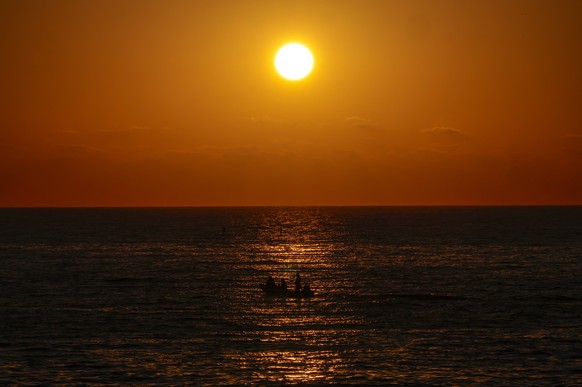 epa13078558 A boat sails during sunset on the coast of the Mediterranean Sea, in Beirut, Lebanon, 01 July 2026. EPA/WAEL HAMZEH