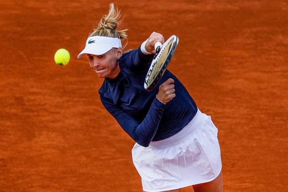 epa09172483 Jil Teichmann of Switzerland in action during her women&#039;s singles match against Paula Badosa of Spain at the Mutua Madrid Open tennis tournament, in Madrid, Spain, 01 May 2021. EPA/Ju ...