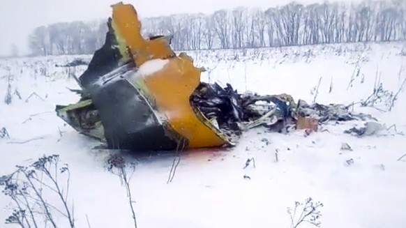 In this screen grab provided by the Life.ru, the wreckage of a AN-148 plane is seen in Stepanovskoye village, about 40 kilometers (25 miles) from the Domodedovo airport, Russia, Sunday, Feb. 11, 2018. ...