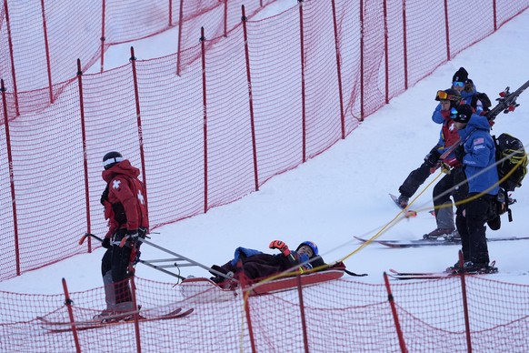 Mikaela Shiffrin, of the United States, is taken down the mountain on a sled by ski patrol after crashing during the second run of a women&#039;s World Cup giant slalom skiing race, Saturday, Nov. 30, ...