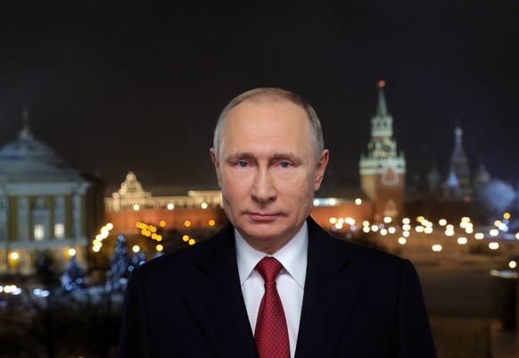 In this photo released by Kremlin Press service via Sputnik agency, Russian President Vladimir Putin speaks during a recording of his annual televised New Year&#039;s message in the Kremlin in Moscow, ...