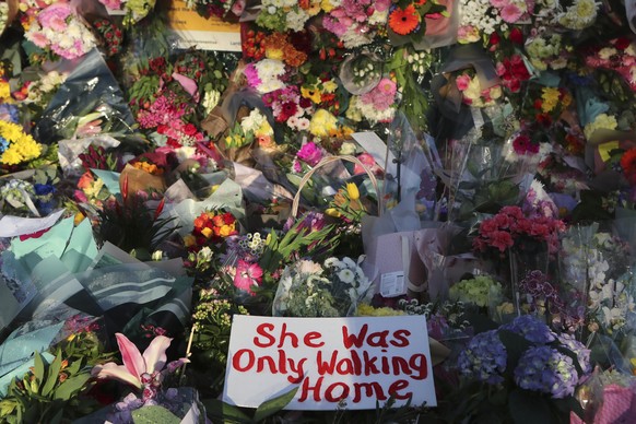 Floral tributes are placed at the bandstand in Clapham Common on Sunday, March 14, 2021, in memory of Sarah Everard who abducted and murdered after last being seen walking home from a friend's apartme ...