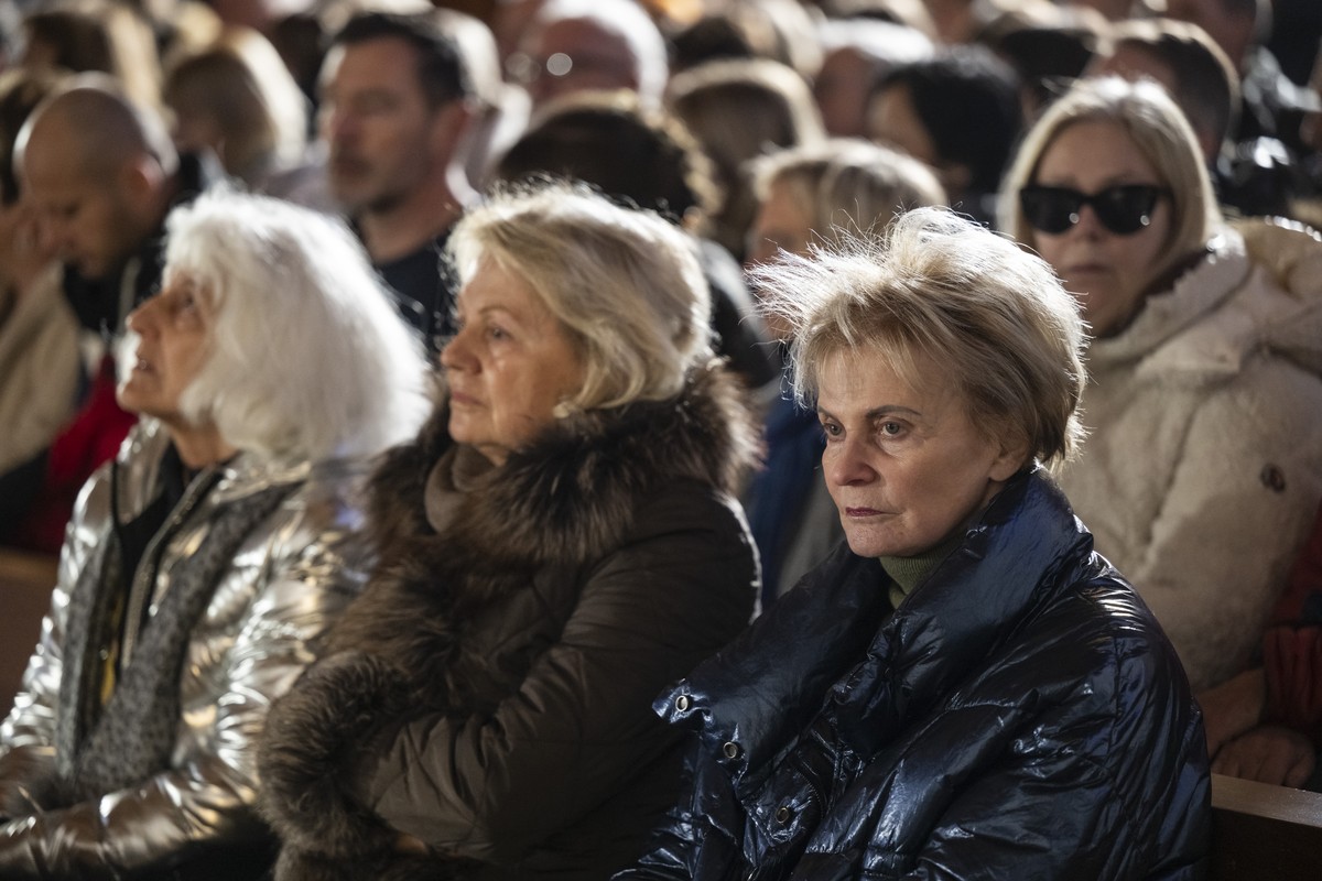 Former Swiss Federal President Micheline Calmy-Rey participates in the Sunday mass at the catholic chapel of Saint-Christophe dedicated to the victims of the fire at the 'Le Constellation' b ...