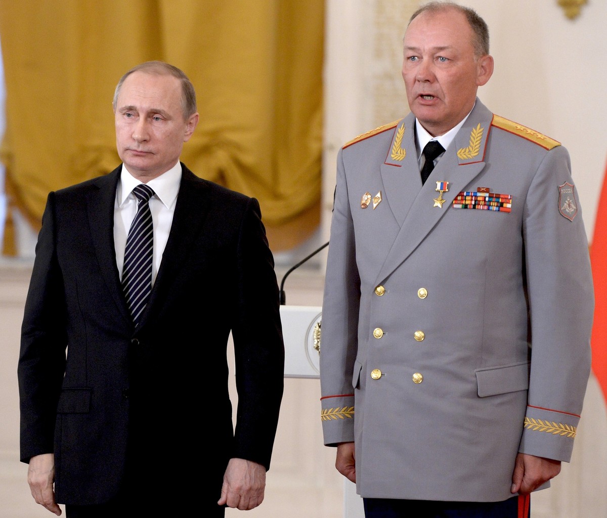 FILE - Russian President Vladimir Putin, left, poses with Col. Gen. Alexander Dvornikov during an awarding ceremony in Moscow's Kremlin, Russia on March 17, 2016. Dvornikov was appointed the new  ...