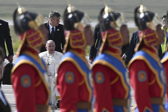 epa10832762 Pope Francis arrives at Chinggis Khaan International Airport in Ulaanbataar, Mongolia, 01 September 2023. EPA/CIRO FUSCO