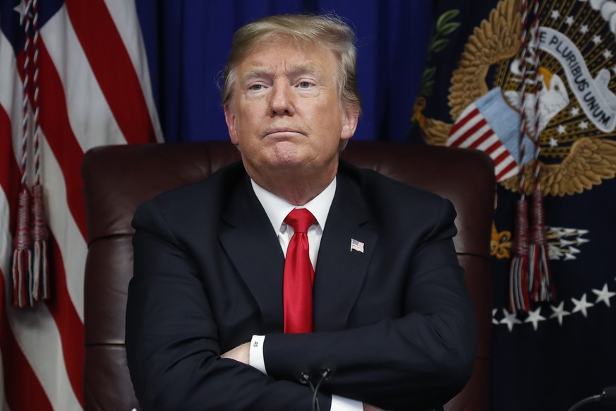 President Donald Trump listens during a roundtable discussion on the First Step Act, Monday, Nov. 26, 2018, in Gulfport, Miss. (AP Photo/Alex Brandon)