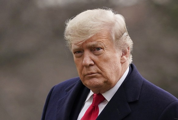 FILE - In this Dec. 31, 2020, file photo, President Donald Trump arrives on the South Lawn of the White House, in Washington. New York prosecutors have convened a special grand jury to consider eviden ...