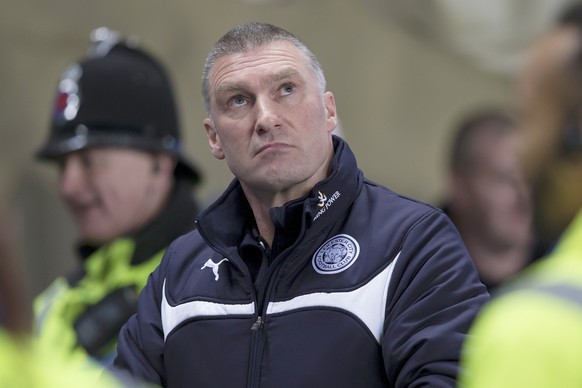In this March 4, 2015, file photo, Leicester City manager Nigel Pearson stands at his team&#039;s English Premier League soccer match with Manchester City at the Etihad Stadium in Manchester, England. ...