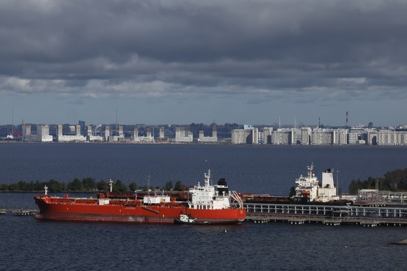 epa12407697 Oil products tankers Vela (Singapore, L) and Jag Sparrow (Bahamas, R) are moored at the berth of St. Petersburg Oil Terminal, in the Port of St. Petersburg, Russia, 26 September 2025. The  ...