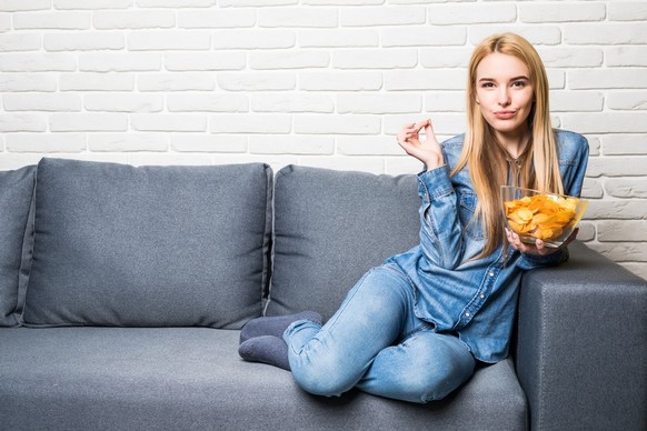 woman eating chips