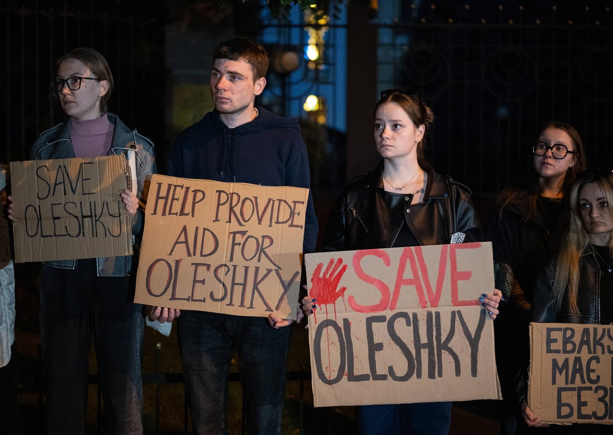 RECORD DATE NOT STATED Activists hold placards with slogans during a rally in support of residents of Oleshky, Kherson region, calling on the international community to draw attention to the humanitar ...