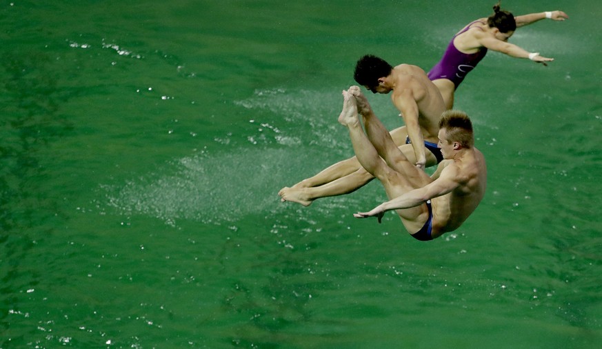 Britain&#039;s Jack Laugher and Chris Mears take part in training before the men&#039;s synchronized 3-meter springboard diving final in the green water of the diving pool at the Maria Lenk Aquatic Ce ...