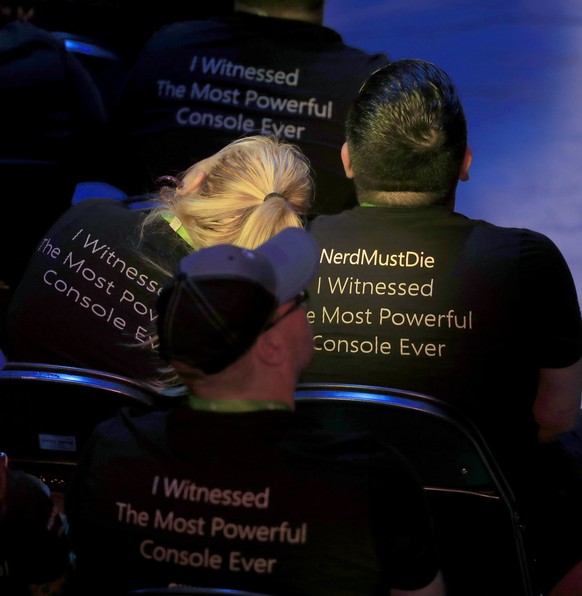 epa06023659 Attendees wear t-shirts reading &#039;Nerd Must Die, I Witnessed the Most Powerful Console Ever&#039; at the Xbox E3 2017 Press Conference in Los Angeles, California, USA, 11 June 2017. Th ...
