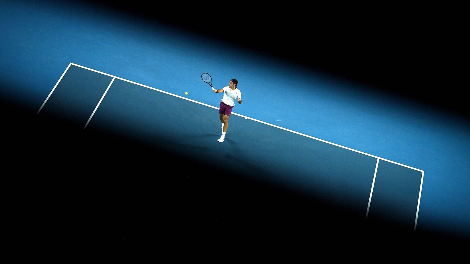 AUSTRALIAN OPEN DAY 7, Roger Federer of Switzerland plays a return shot during his fourth round match against Marton Fucsovics of Hungary on day seven of the Australian Open tennis tournament at Rod L ...