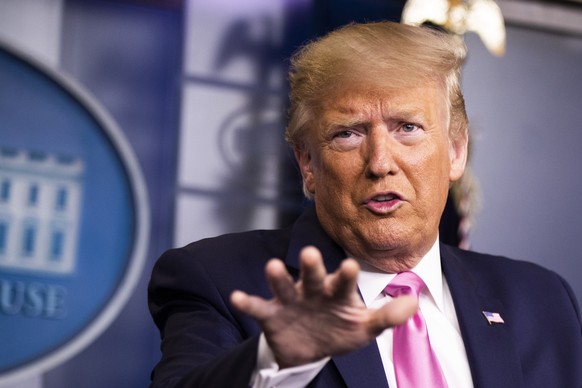President Donald Trump with members of the president&#039;s coronavirus task force speaks during a news conference at the Brady press briefing room of the White House, Wednesday, Feb. 26, 2020, in Was ...