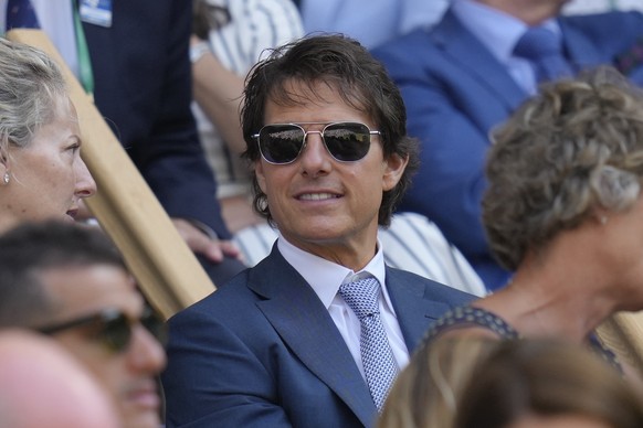 Film star Tom Cruise smiles sits in the Royal Box for the final of the women&#039;s singles between Tunisia&#039;s Ons Jabeur and Kazakhstan&#039;s Elena Rybakina on day thirteen of the Wimbledon tenn ...