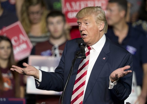 Republican presidential candidate Donald Trump gestures to the crowd during a rally in Roanoke, Va., Saturday, Sept. 24, 2016. Trump faces Democratic opponent Hillary Clinton in the first of three deb ...