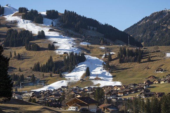 epa05681489 View of a swath of artifical snow at the World cup slope of the Chuenisbaergli in Adelboden, Switzerland, on Sunday, December 18, 2016. The FIS Ski World Cup Adelboden will take place from ...