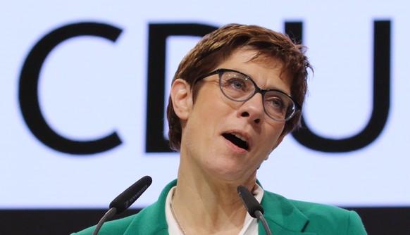 epa07216236 Newly elected chairwoman Annegret Kramp-Karrenbauer delivers her speech on the second day of the 31st Party Congress of the Christian Democratic Union (CDU) in Hamburg, Germany, 08 Decembe ...
