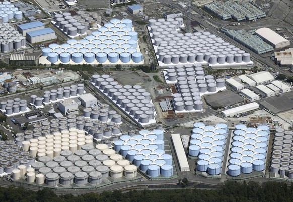 This aerial view shows the tanks which contain treated radioactive wastewater at the Fukushima Daiichi nuclear power plant in Fukushima, northern Japan, on Aug. 22, 2023. For the wrecked Fukushima Dai ...