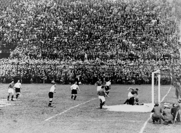 Italian forward Guaita scores the winning goal in the World Cup semifinal against Austria in Milan, Italy, as the home team went on to reach the final thanks to a 1-0 victory. Italy later defeated Cze ...