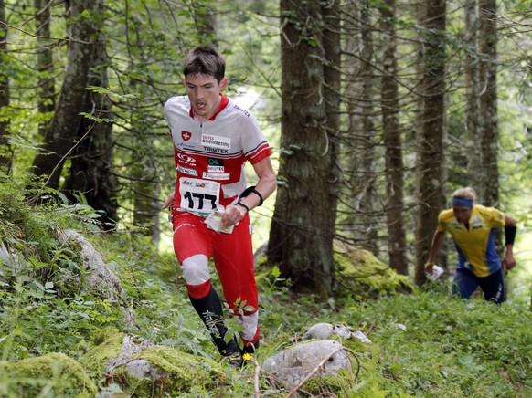 HANDOUT - Fabian Hertner of Switzerland during the middle distance discipline at the orienteering World Championships in Campomulo/Gallio, Italy, on Friday, July 11, 2014. Fabian Herner won the silver ...