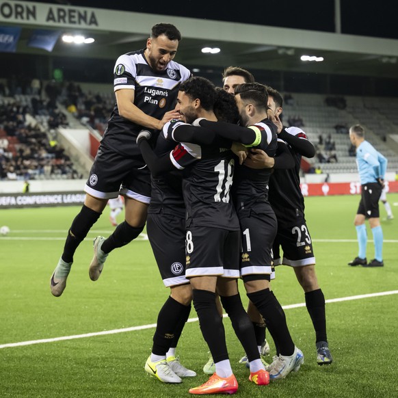 epa11746521 Lugano&#039;s Hicham Mahou (C) celebrates scoring the opening goal during the UEFA Conference League soccer match between Switzerland&#039;s FC Lugano and Belgium&#039;s KAA Gent, at the S ...